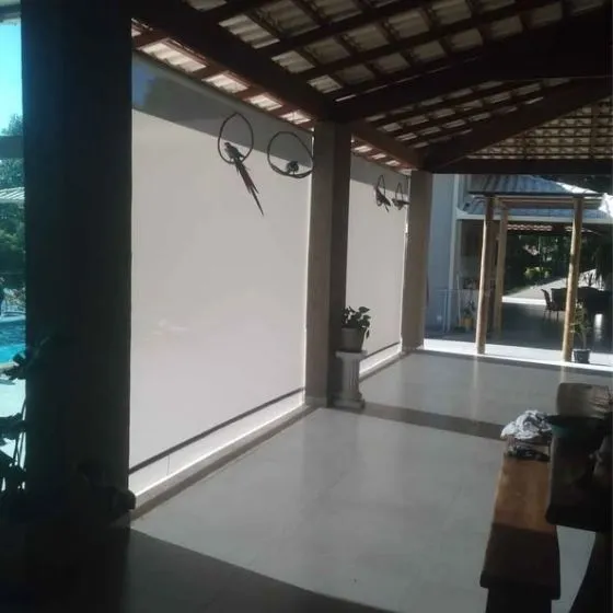 Toldo Cortina de Tela Screen em São Caetano do Sul SP Toldo Cortina de Tela Screen em São Caetano do Sul SP — Cobertura em passagem coberta entre ambientes