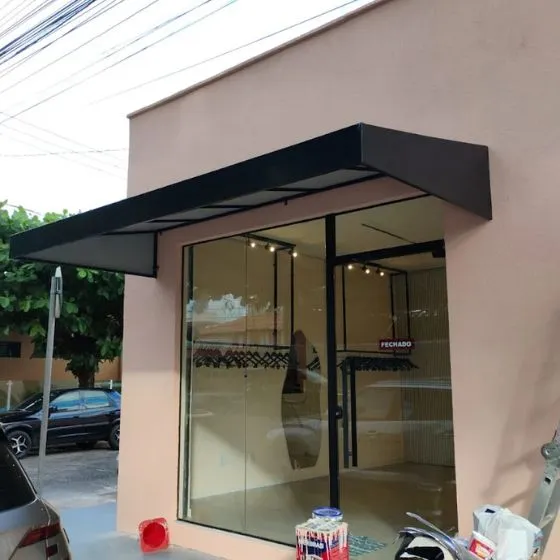 Toldo Fixo de Lona PVC em São Caetano do Sul SP Toldo Fixo de Lona PVC em São Caetano do Sul SP — Instalação em área gourmet com churrasqueira